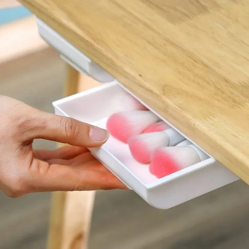 Hidden makeup pen holder under desk